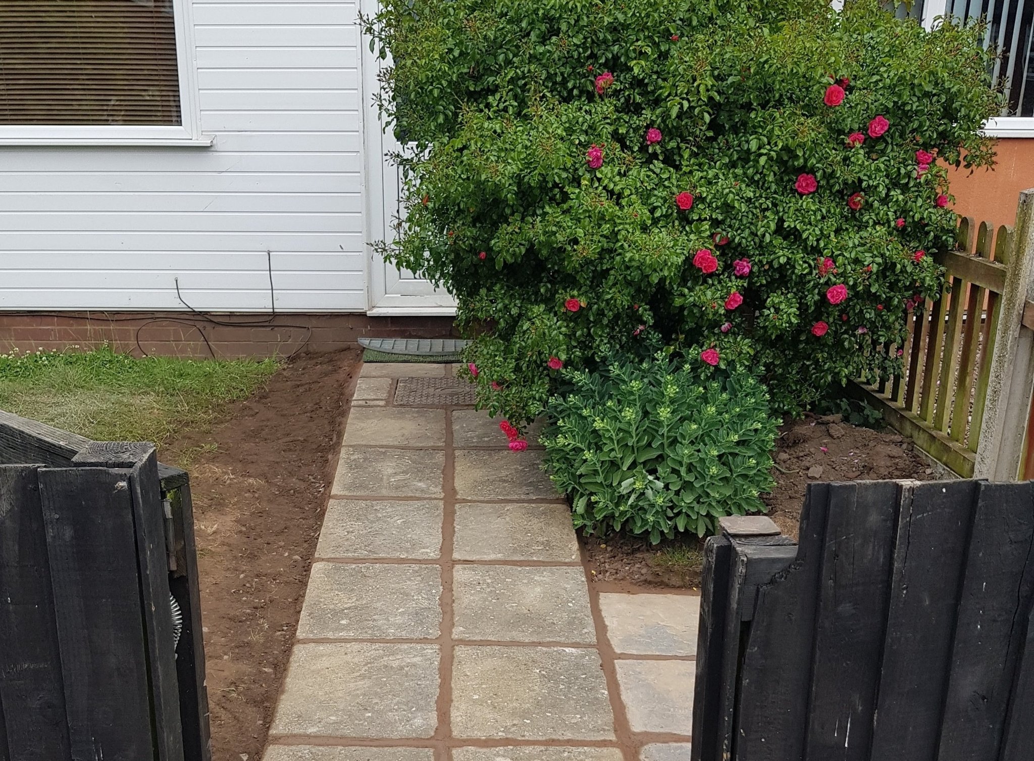 New slab path leading to the front door